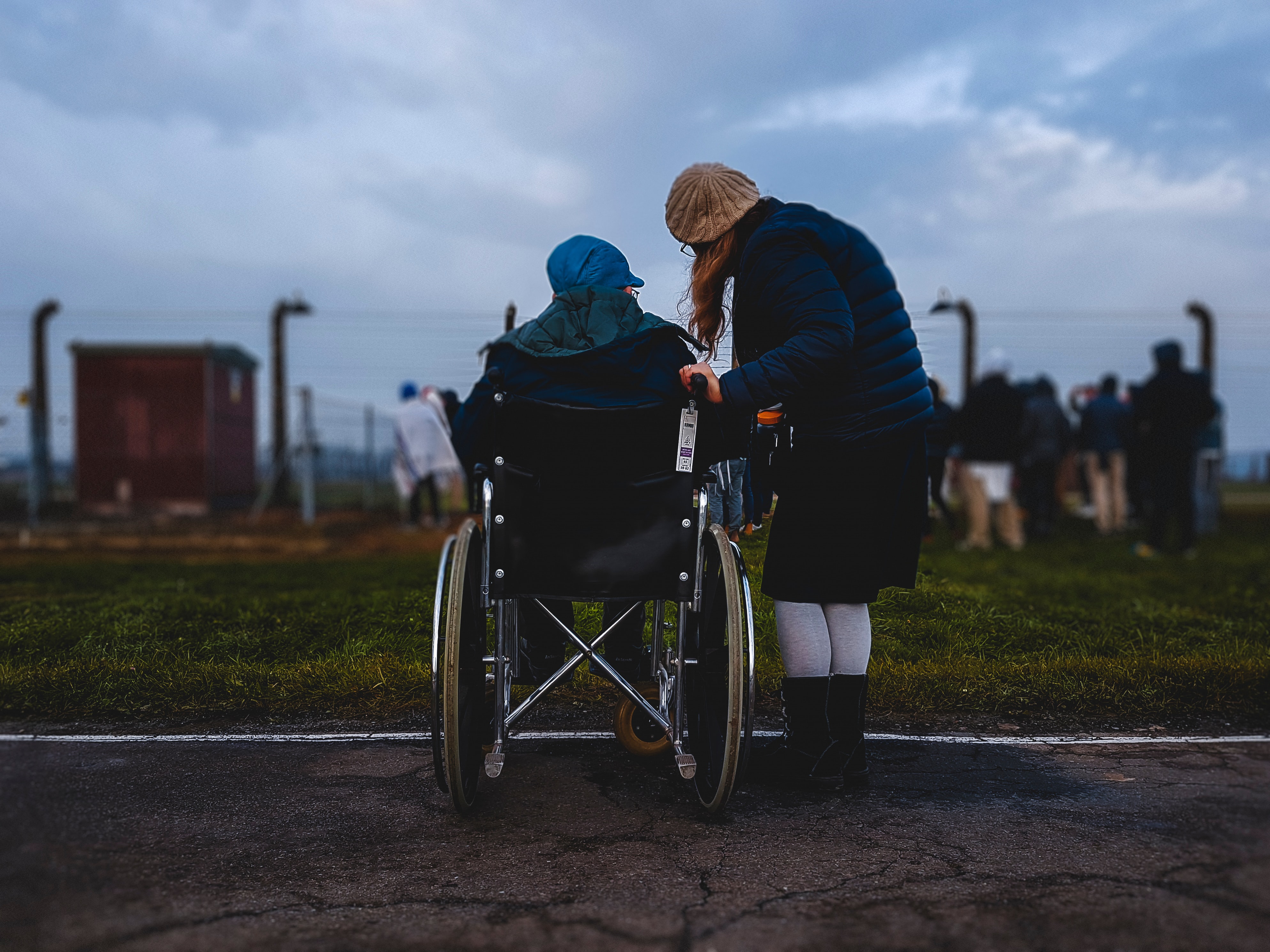 Two people watching sport